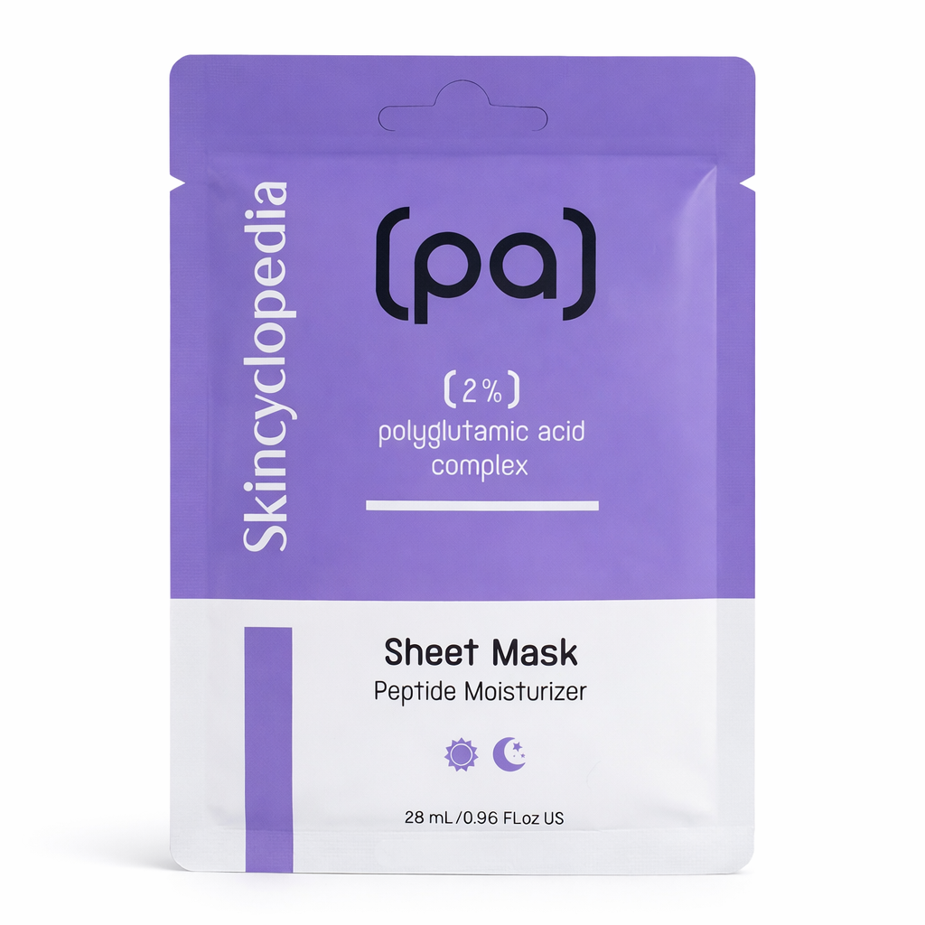 Lila-weiße Verpackung einer Gesichtsmaske. Aufdruck mit Markennamen, Produktart und Inhaltsstoffen. Sonnen- und Mondsymbol am unteren Rand.