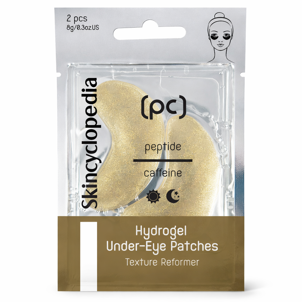 Verpackung für Hydrogel-Augenpads. Zwei goldfarbene Pads sind in einer transparenten Kunststoffverpackung sichtbar. Auf der Vorderseite stehen Markennamen und Produktinformationen.