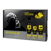 Produktbox des 3-teiligen Glatzenpflege-Sets. Abgebildet sind Shampoo, Serum und Feuchtigkeitscreme von THE BALD THEORY.
