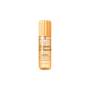 Flacone spray dorato della fragranza per capelli e corpo FRANK BODY Glazed 'n' Dazed su sfondo bianco