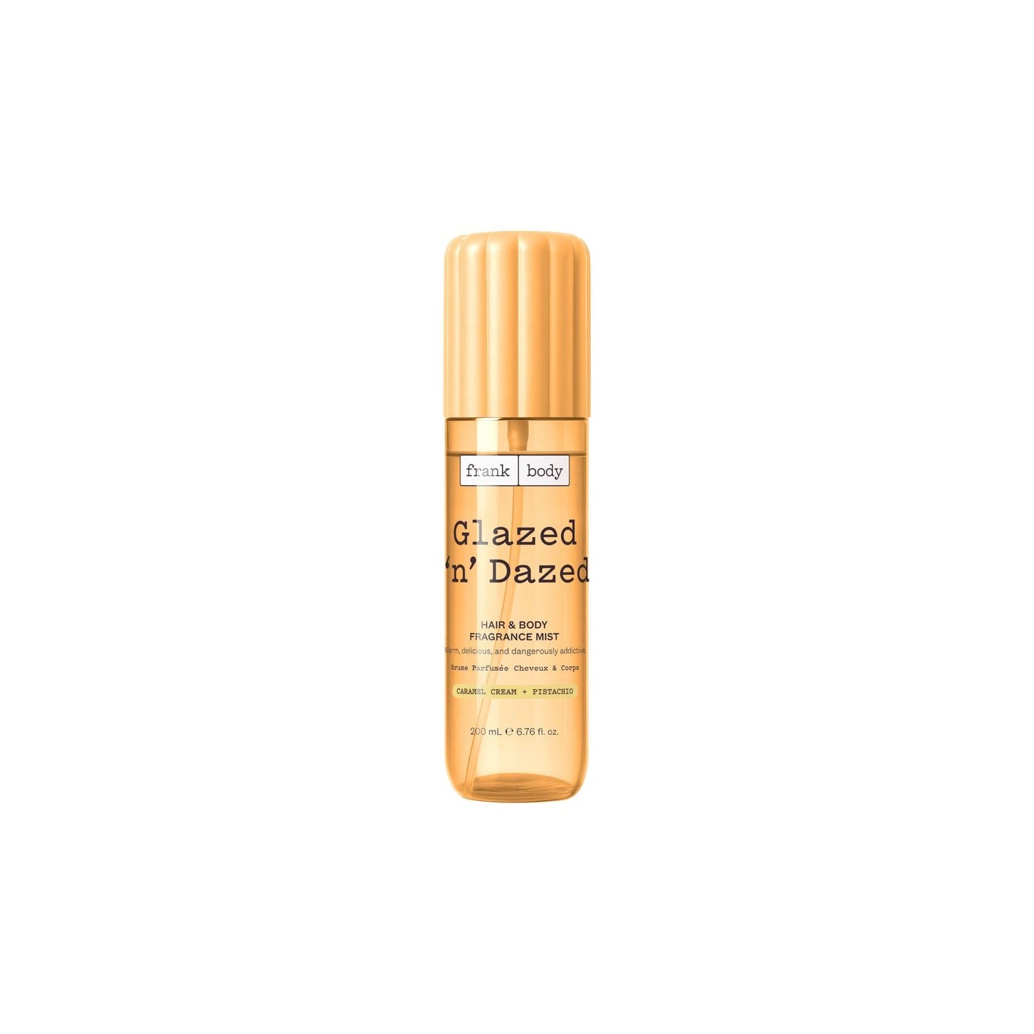 Flacone spray dorato della fragranza per capelli e corpo FRANK BODY Glazed 'n' Dazed su sfondo bianco