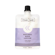 FRANK BODY Loção Corporal com Retinol em embalagem flexível de 50 ml com design em tom lilás e tampa preta