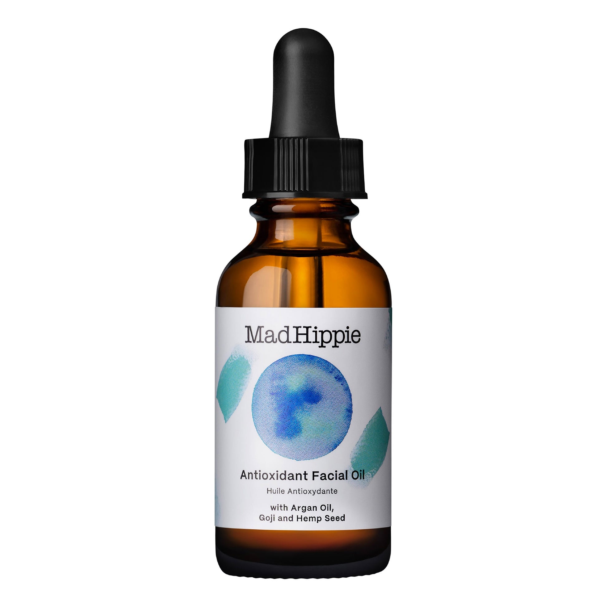 Óleo facial antioxidante MAD HIPPIE num frasco de vidro castanho com pipeta preta, sobre um fundo branco