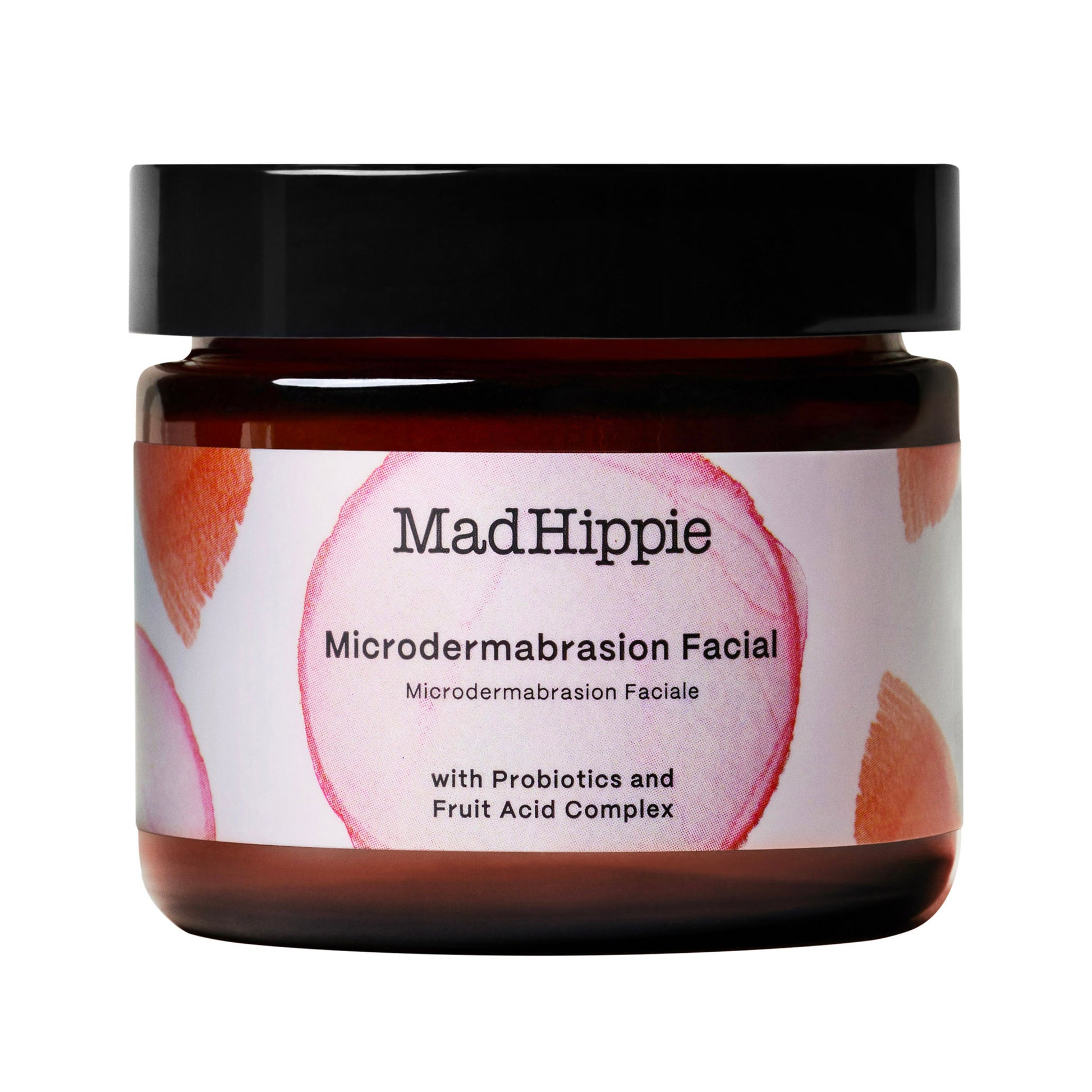 Brauner Tiegel mit schwarzem Deckel und weißem Etikett. Auf dem Etikett steht "Mad Hippie Microdermabrasion Facial" mit Probiotika und Fruchtsäurekomplex.