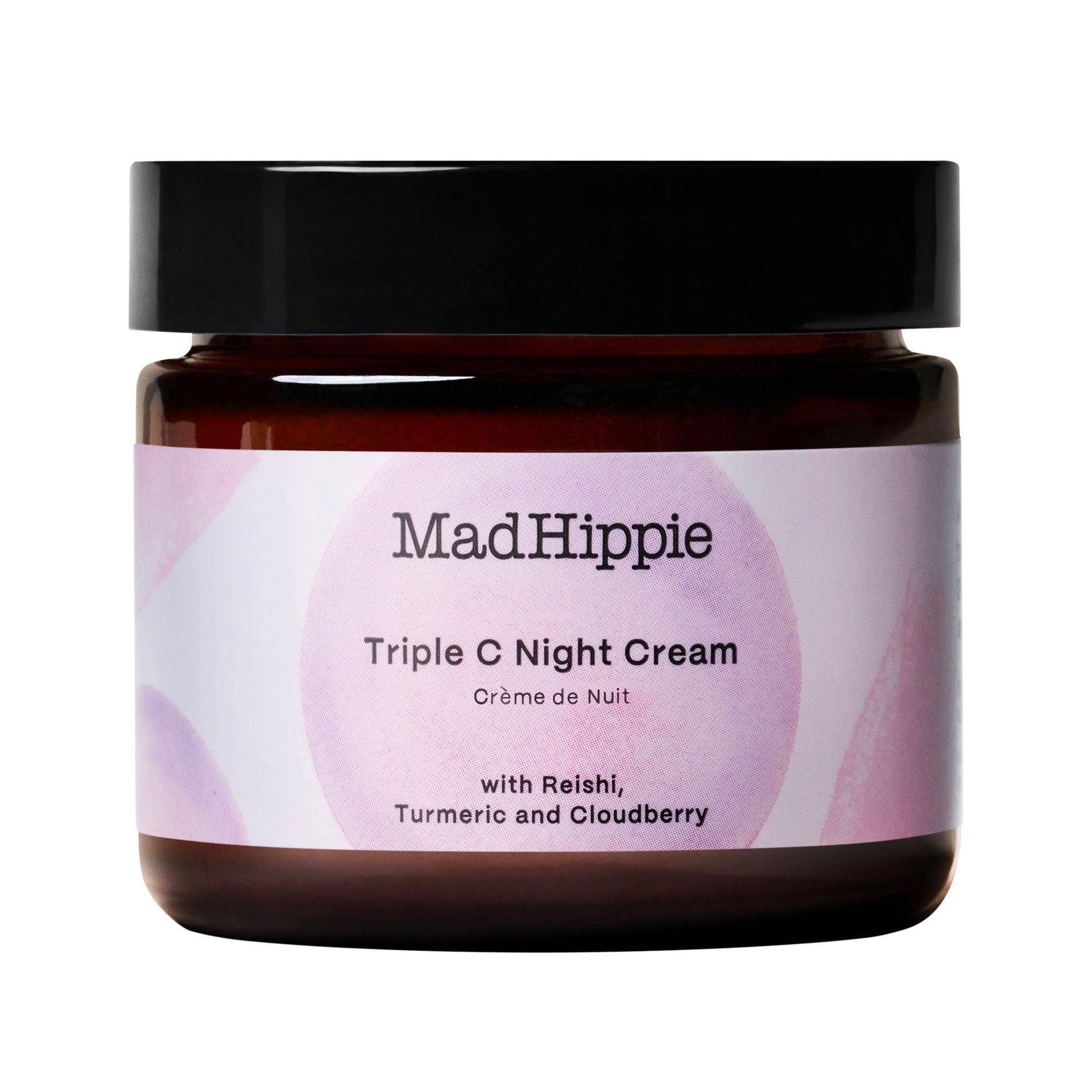 Brauner Tiegel mit schwarzem Deckel. Etikett mit Schriftzug Mad Hippie Triple C Night Cream. Rosa Farbkleckse auf dem Etikett.