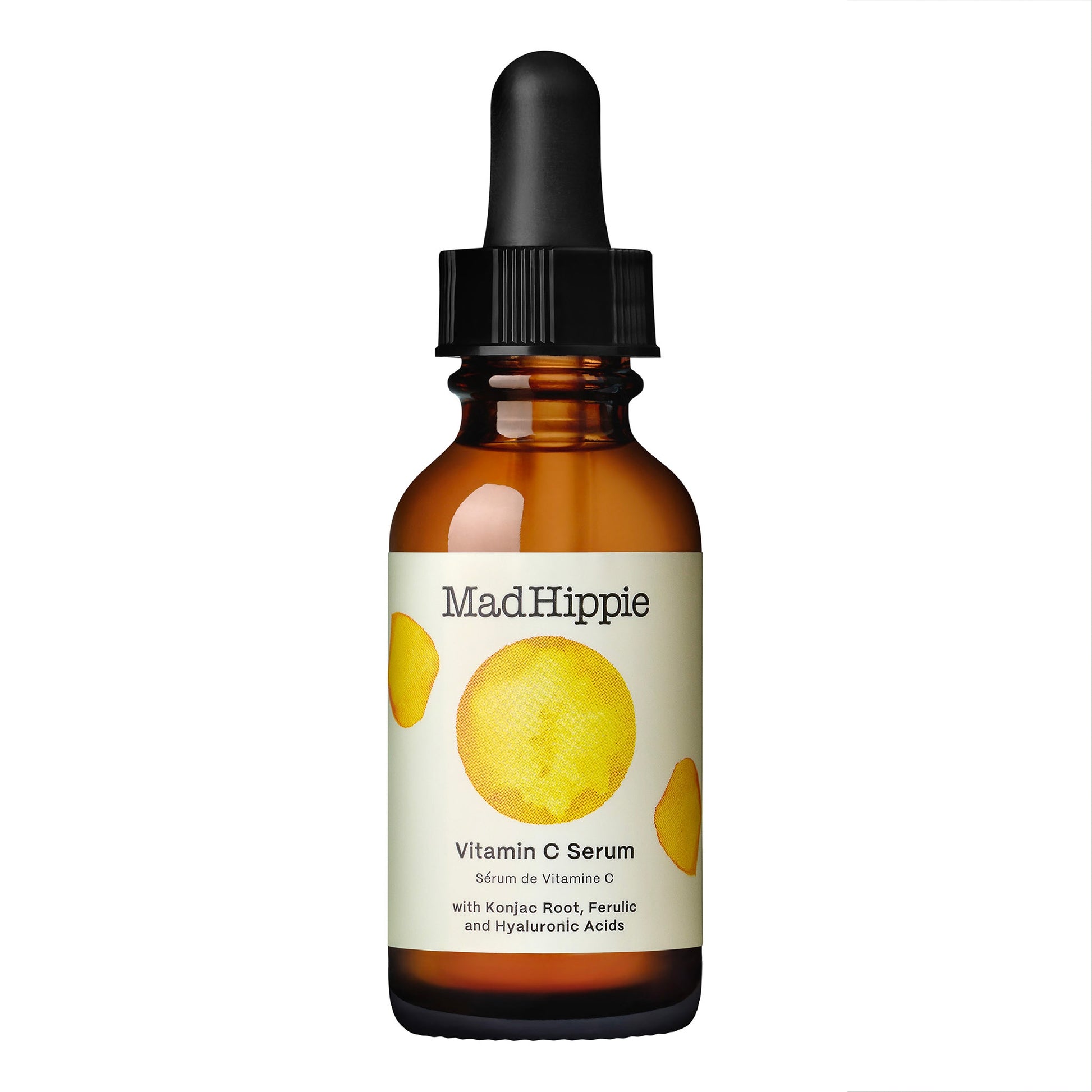 Frasco de vidro castanho com pipeta preta do sérum de vitamina C MAD HIPPIE sobre fundo branco