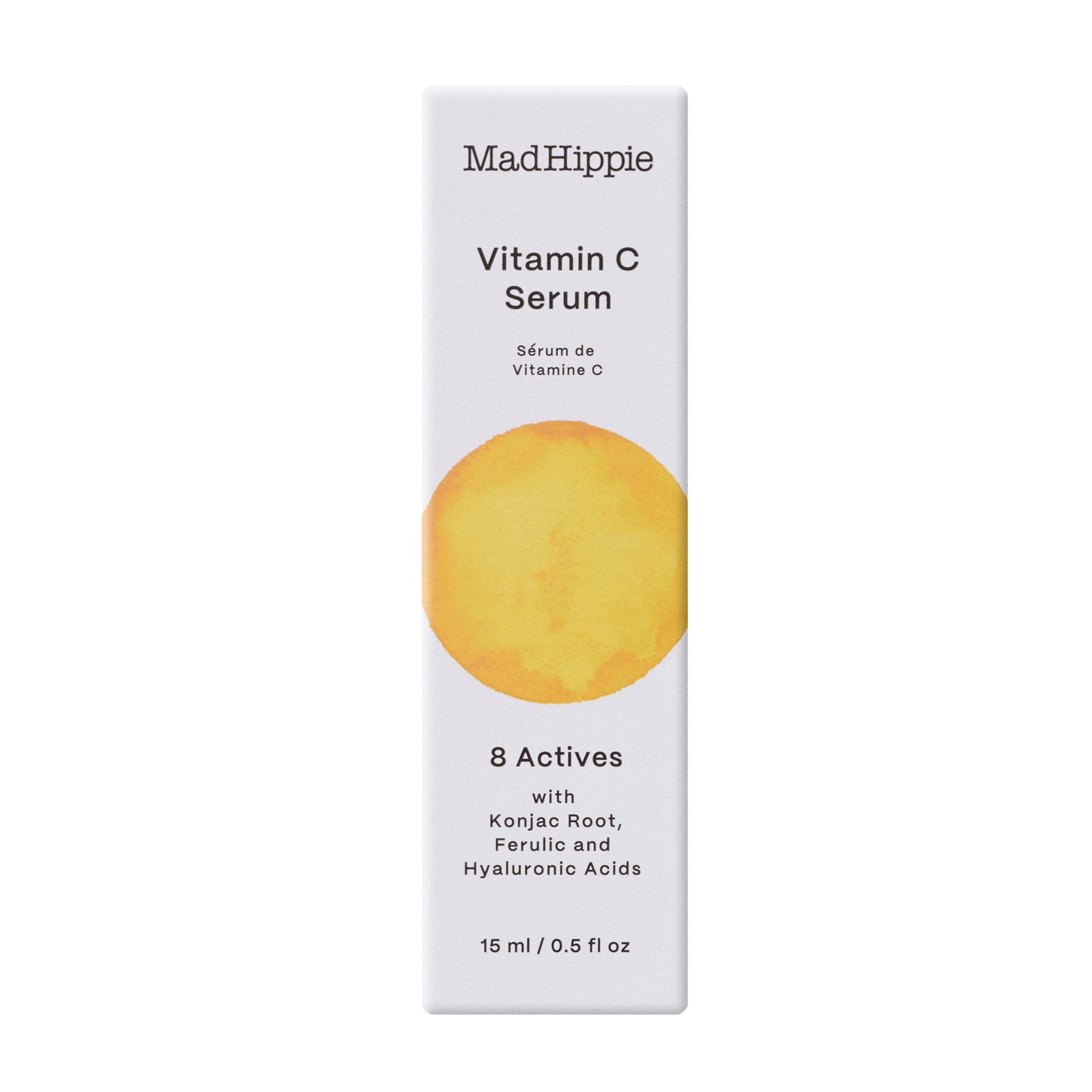 Embalagem branca do sérum de vitamina C MAD HIPPIE, com um grande círculo amarelo pintado em aquarela na parte da frente