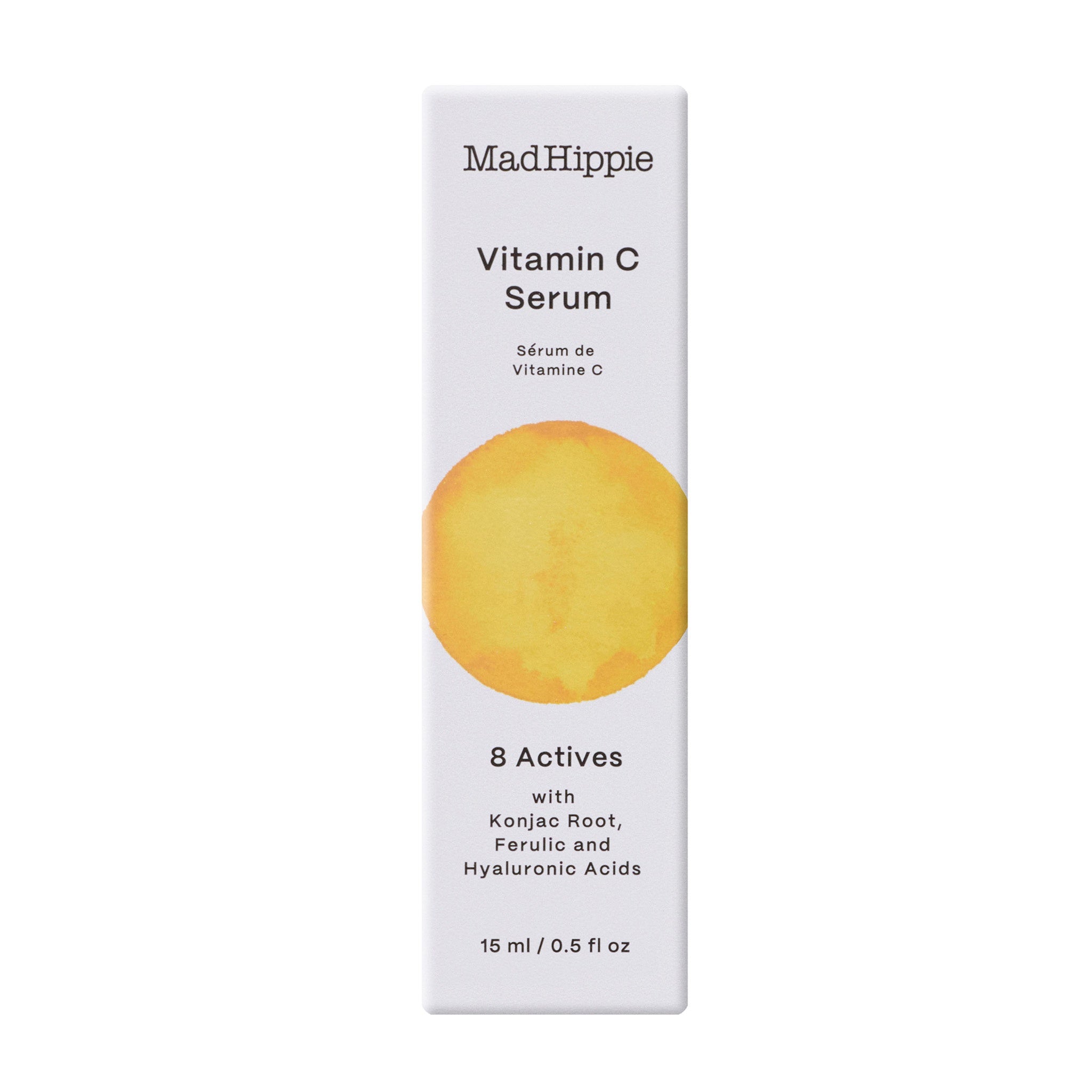 Embalagem branca do sérum de vitamina C MAD HIPPIE, com um grande círculo amarelo pintado em aquarela na parte da frente