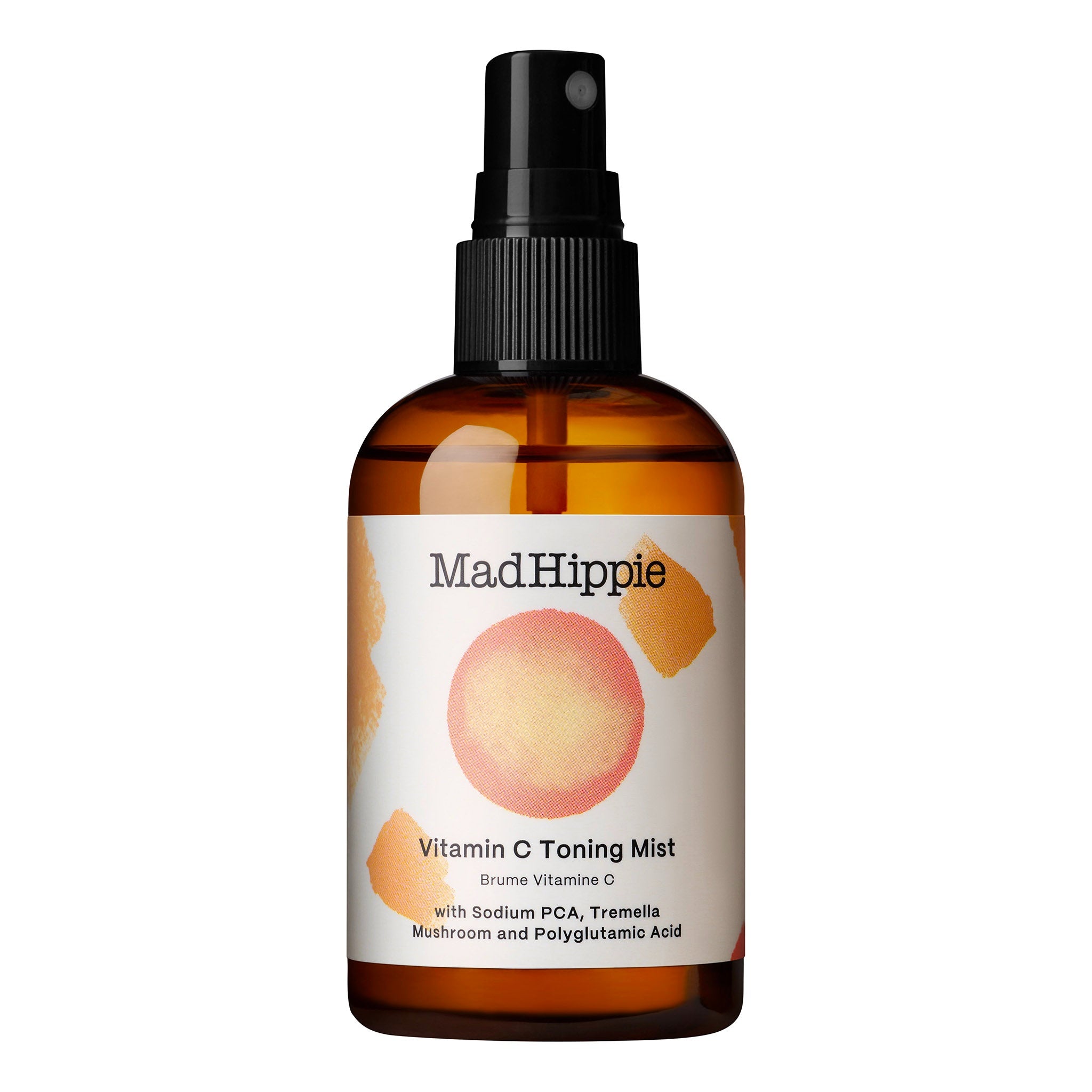 Braune Sprühflasche Mad Hippie Vitamin C Toning Mist mit schwarzem Sprühkopf und weißem Etikett.