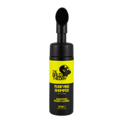 Schwarze Shampoo-Flasche mit Bürstenaufsatz. Gelbes Etikett mit "The Bald Theory Purifying Shampoo". Text in Schwarz.