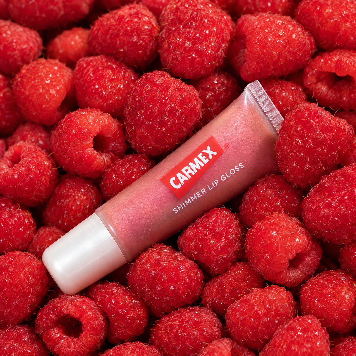 CARMEX Lipgloss Shimmer Raspberry mit Himbeeren