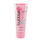 Eine durchsichtige Tube mit "Bubble T". HYDRATOR-Lotion mit rosafarbener Kappe und rosa Akzenten. Auf dem Etikett steht, dass sie Hyaluronsäure und Mandelöl enthält.