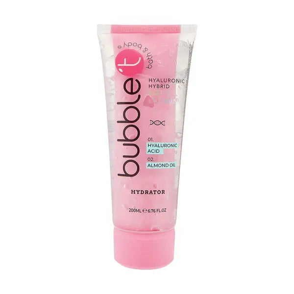 Eine durchsichtige Tube mit "Bubble T". HYDRATOR-Lotion mit rosafarbener Kappe und rosa Akzenten. Auf dem Etikett steht, dass sie Hyaluronsäure und Mandelöl enthält.